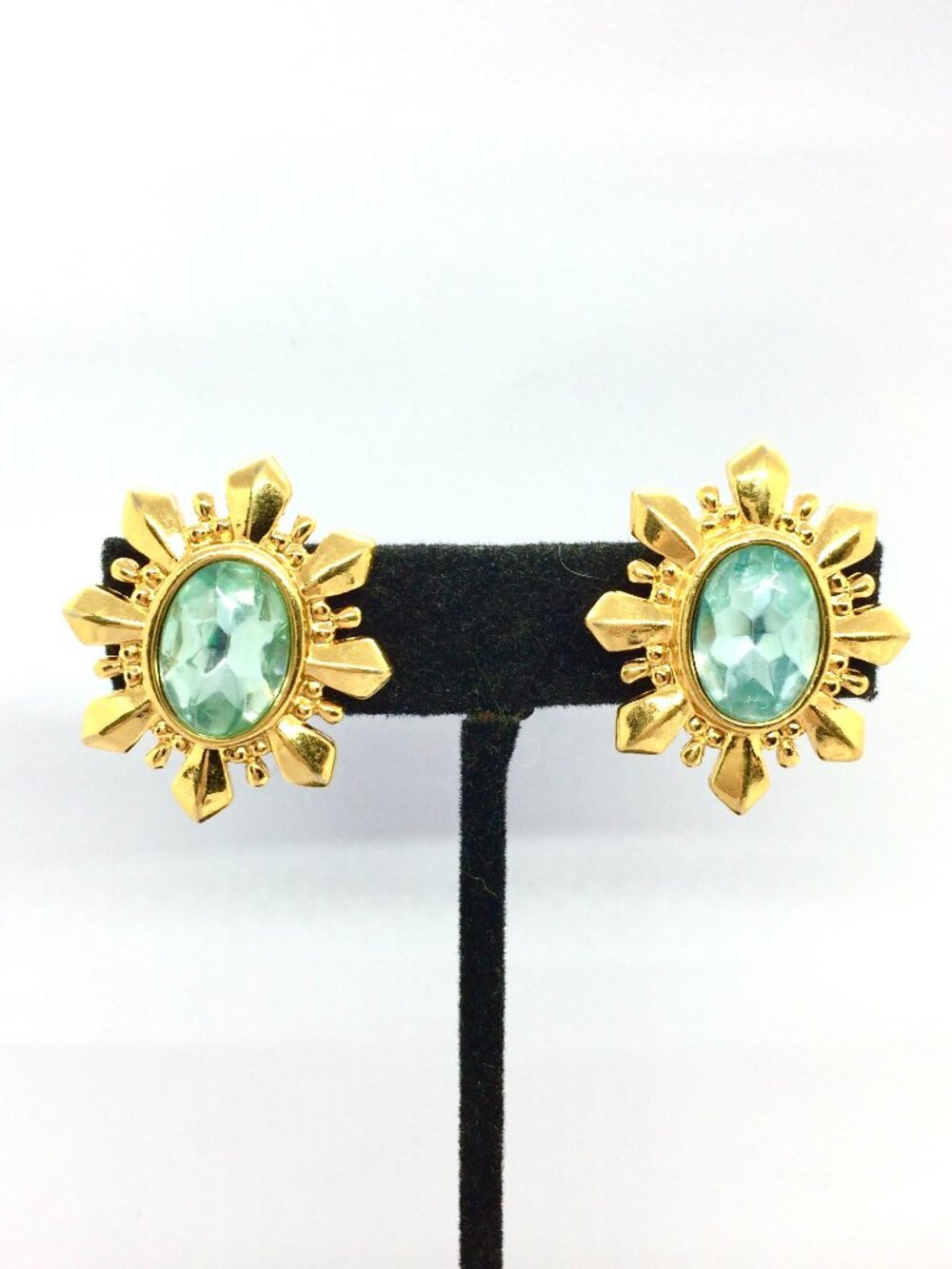 VINTAGE AVON EARRINGS Aqua Blue Rhinestone Gold Tone Starburst Clip On